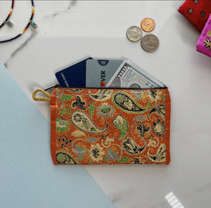 Orange paisley pouch