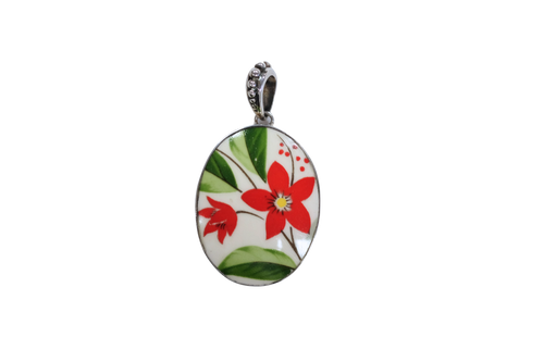 Oval retro poinsettia pendant