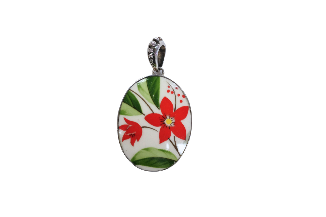 Oval retro poinsettia pendant