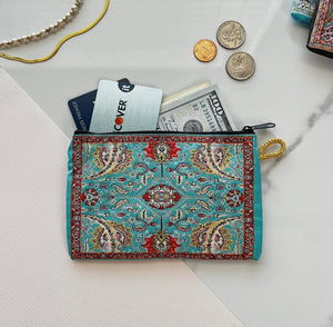 Red and turquoise design pouch