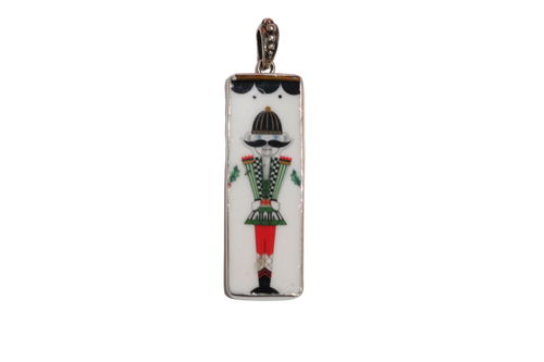 Scalloped Totally Tikaa Nutcracker Pendant