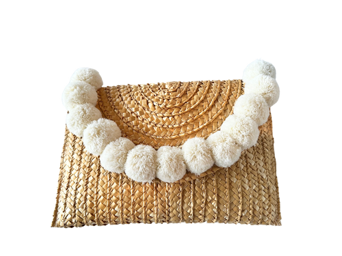 Woven pom pom clutch